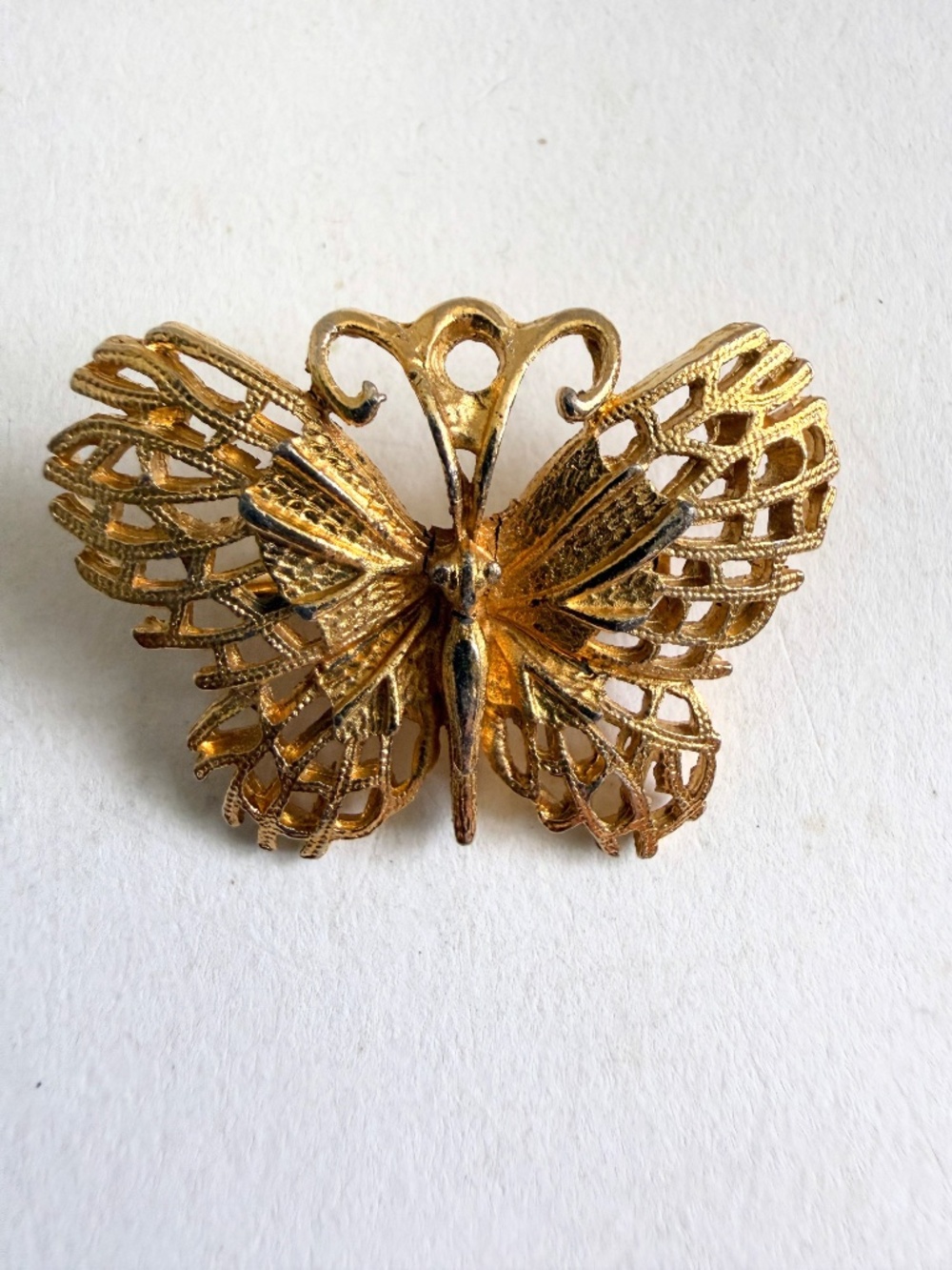 Vintage butterfly brooch gold tone filigree wings 1960s pin back
